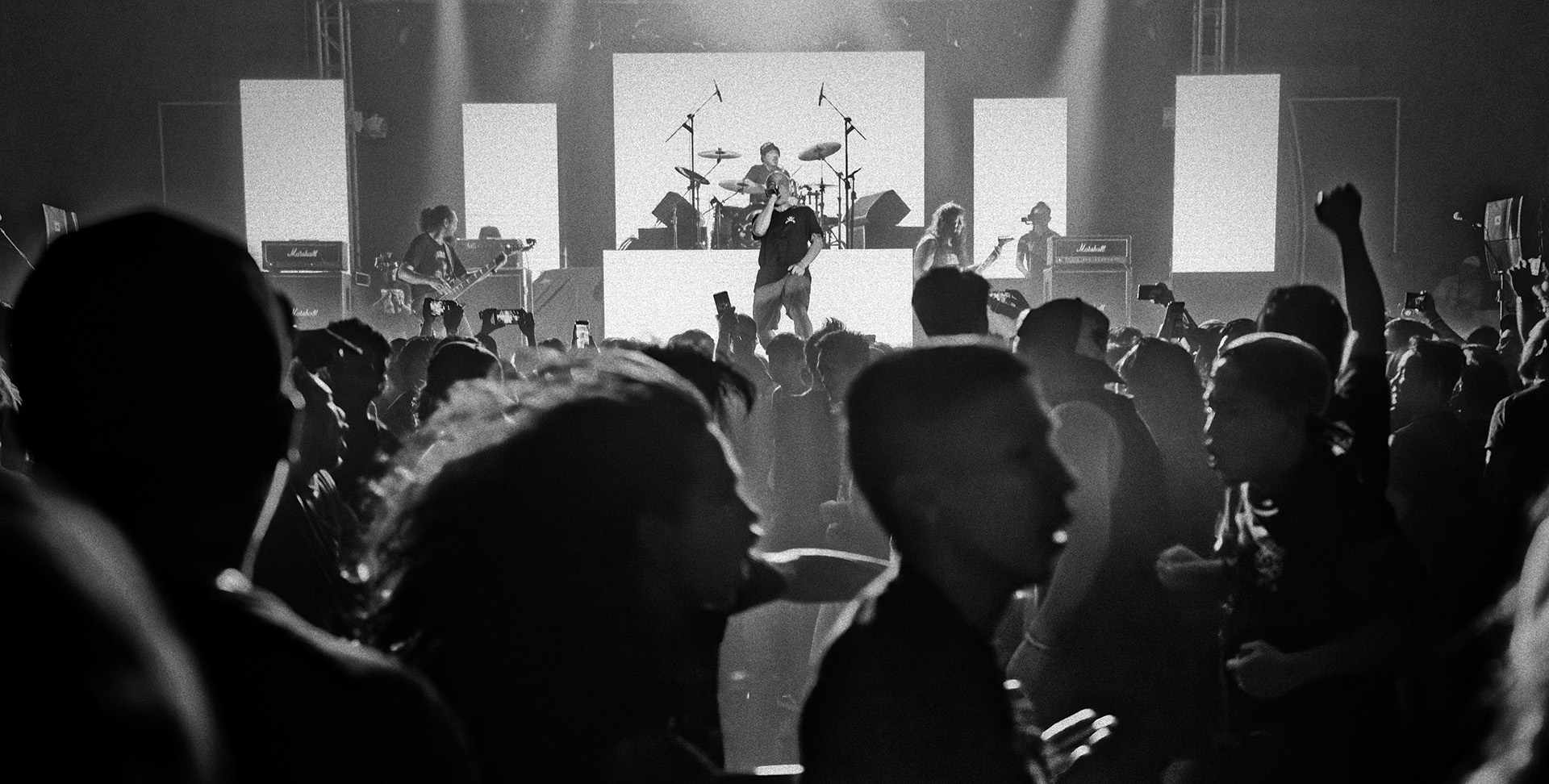 Full-bleed stage/crowd shot